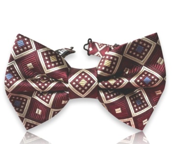 Premium handmade silk bow tie from the Heritage Collection featuring an elegant burgundy geometric jacquard pattern.