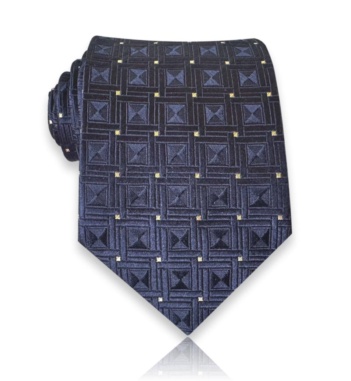 Navy jacquard silk tie with woven square motifs and small golden accents from Neven’s N No. 1978 collection