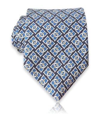 Navy silk twill tie with blue diamond motifs, ivory interlocking links, and small gold accents