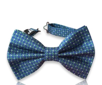 Neven navy blue silk twill bow tie with green circular motifs and an adjustable neck strap on a white background.