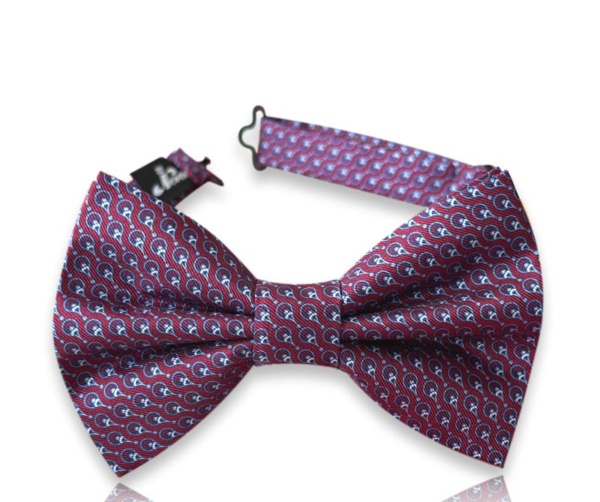 Neven burgundy silk twill bow tie with small blue abstract motifs and an adjustable neck strap on a white background.