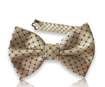 Neven light gold silk jacquard bow tie with a basketweave-inspired geometric pattern and fine dark details on a white background.