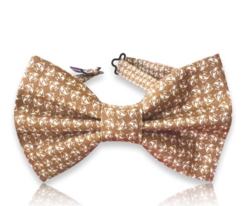 Neven tan silk twill bow tie with small white fish motifs and a matching neck strap on a white background.