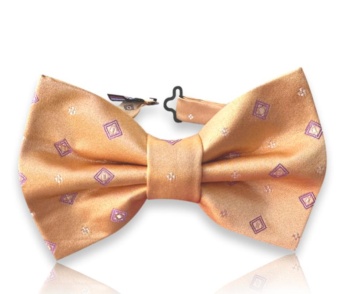 Neven orange silk jacquard bow tie with small purple square motifs and light decorative accents on a white background.