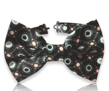 Neven green silk twill bow tie with black, pale green, brown, and cream geometric circle motifs on a white background.