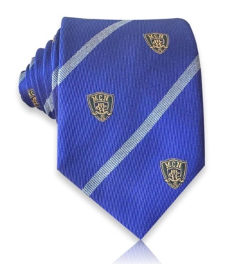 Royal blue jacquard silk tie with light blue-toned diagonal stripes and gold-toned shield motifs