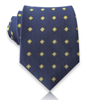 Navy jacquard silk tie with small gold diamond motifs and ivory centers