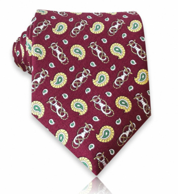 Burgundy silk twill tie with golden-yellow and green paisley motifs and equestrian-inspired details